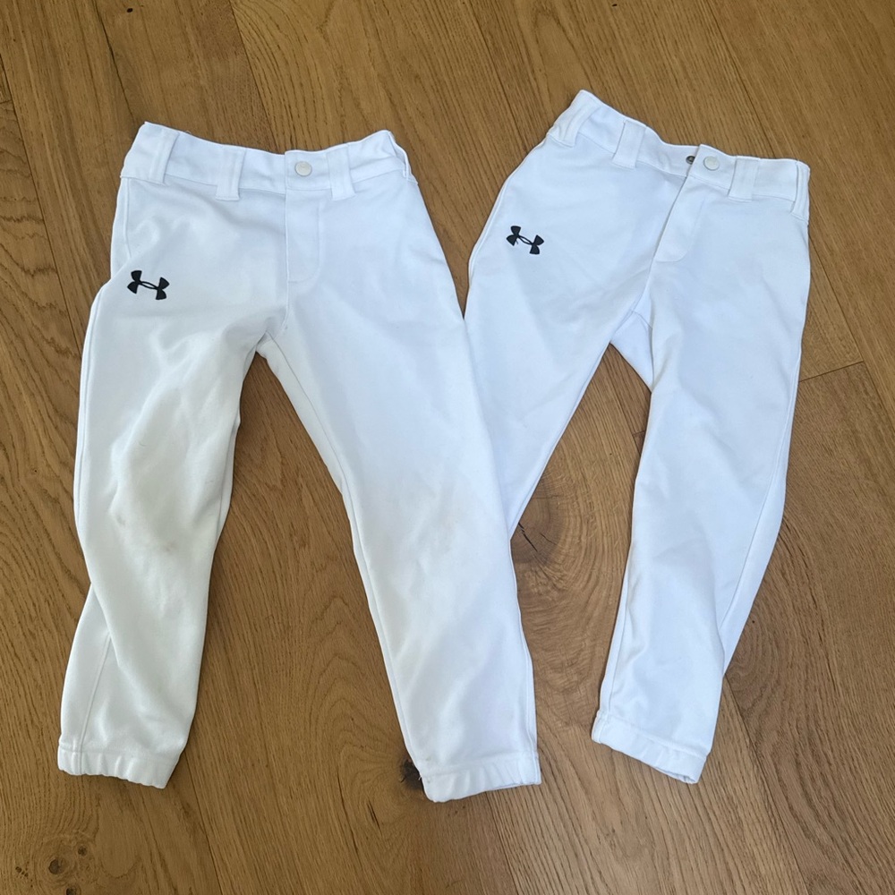 One size 4 and one size 5 under armor white baseball pants